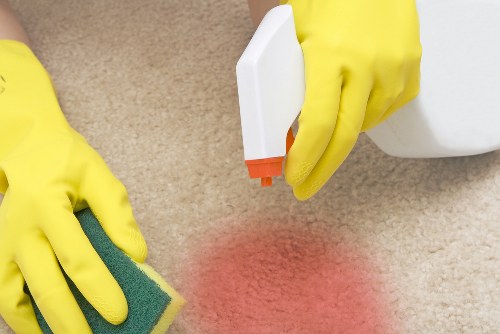 Person using an accessible cleaning service website in SW11