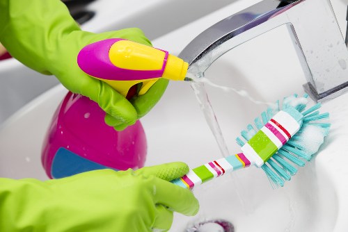 Commercial cleaner maintaining a SW11 office space