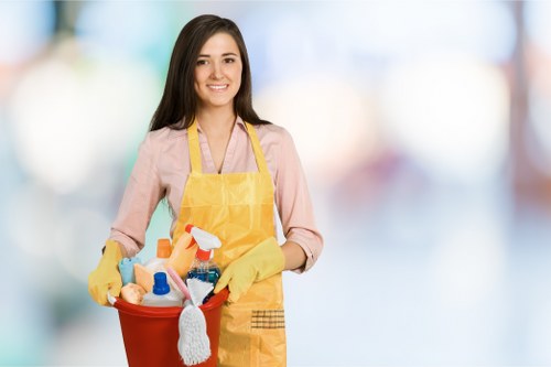 Cleaner using safe working practices during routine cleaning