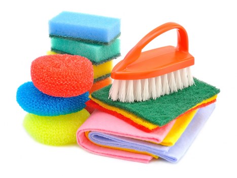 Professional cleaner carrying out a scheduled cleaning task